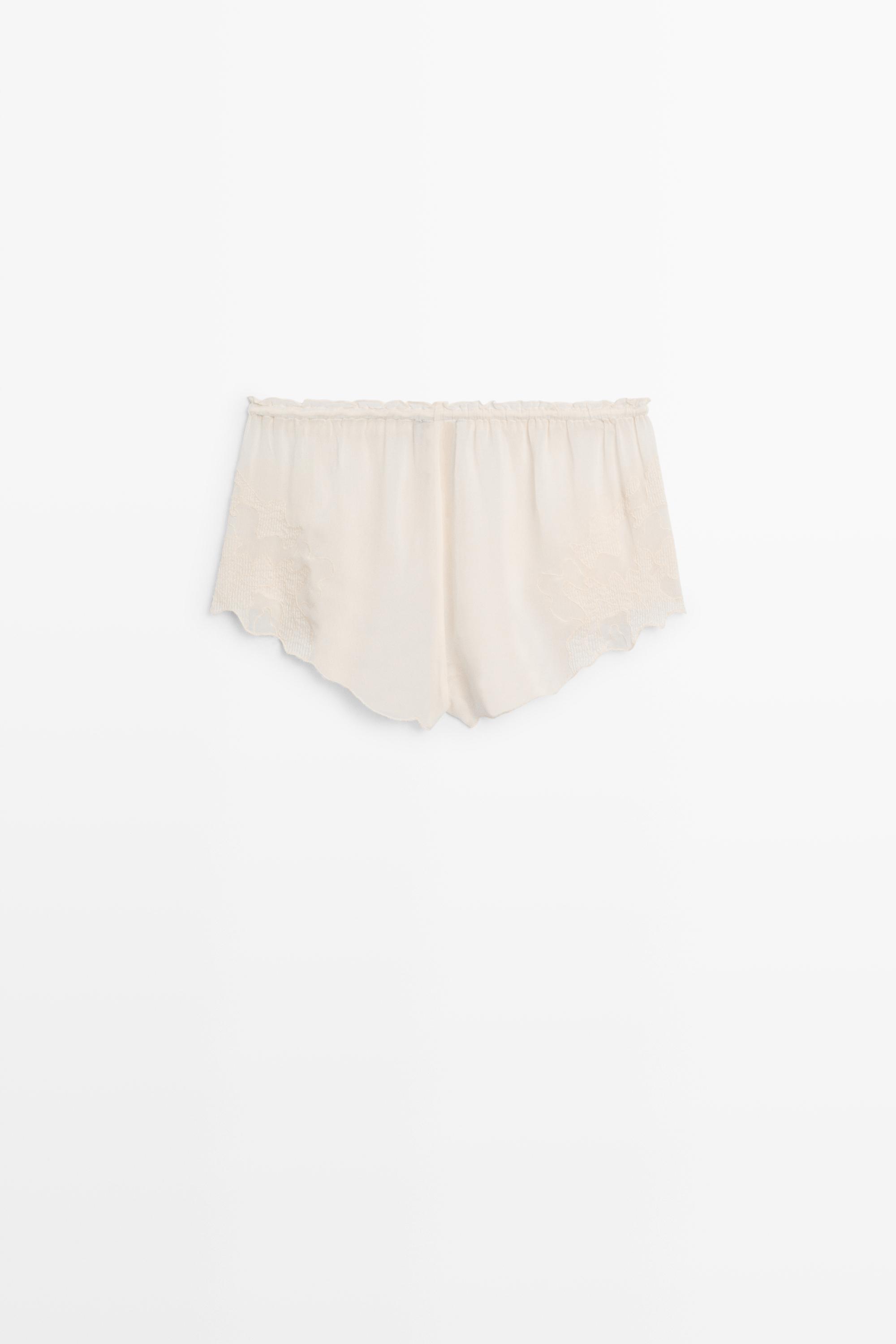 Flowing shorts with embroidered detail